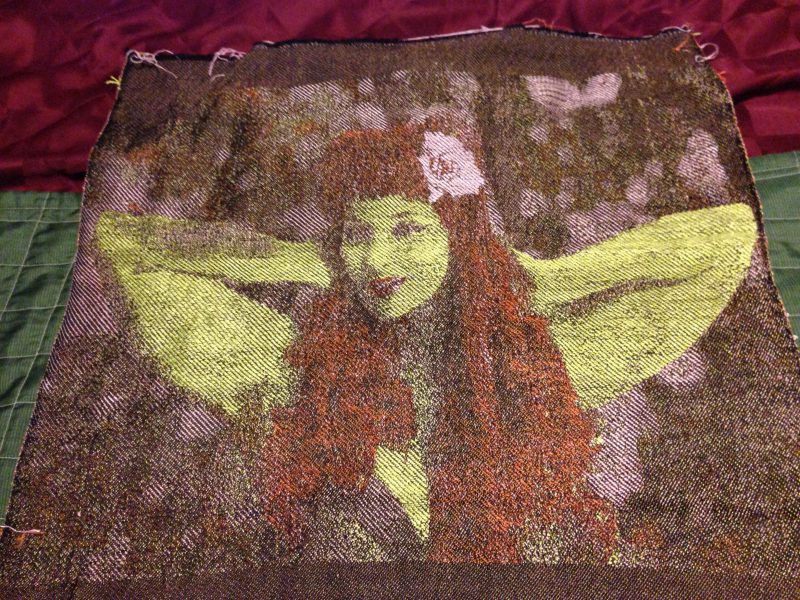 Jacquard weaving of Poison Ivy character from Batman