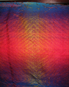 closeup of the unfinished ocean sunset shawl
