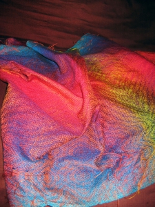 Ocean Sunset shawl crumpled to show the handwoven iridescence