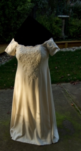 handwoven wedding dress on dress form